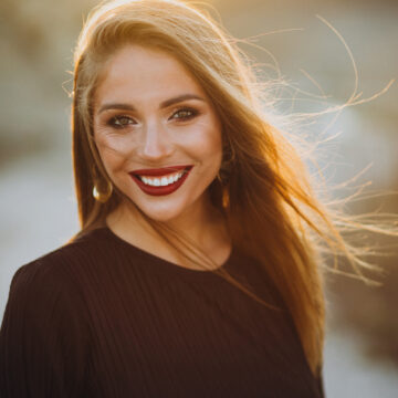 Portrait of a young sensual woman on a sunset